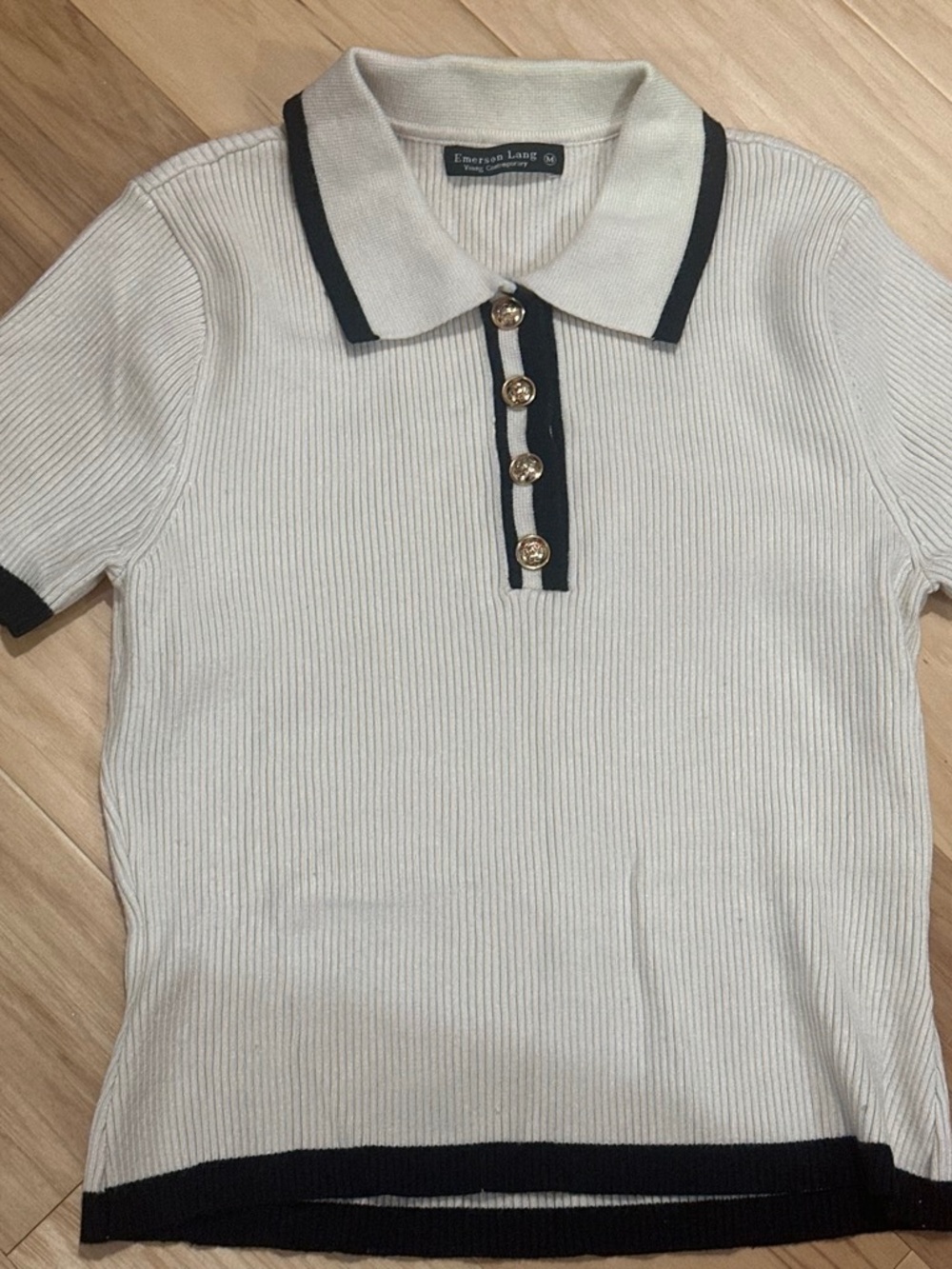 Ribbed Black cream collared polo top with black trim and gold buttons